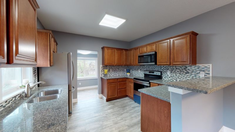 kitchen after renovations by sell now iowa